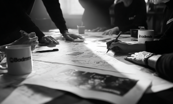 Omar_Rafik_Black_and_white_cinematic_close-up_of_a_team_worki_2d291e1c-c482-4254-a685-6896647943a7_2 Medium